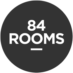 Das Logo von 84 Rooms in weiss